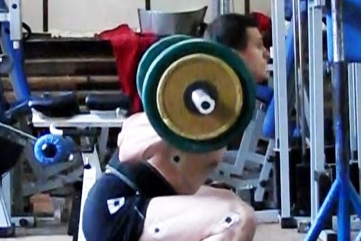 Приседание со штангой на плечах